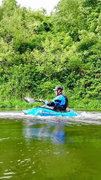Watch my wild kayak tricks on a tranquil forest river