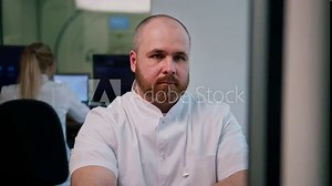 the patient undergoes computed tomography in the clinic the radiologist monitors the procedure and the results of the scan