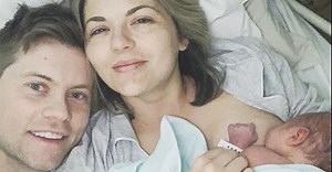 Former Neighbours star Tim Phillipps welcomes first child with wife Jessica