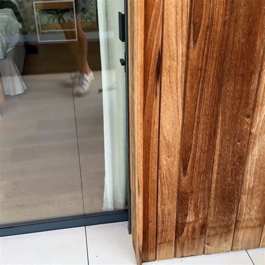 Lifting loose tiles at the balcony during my home inspection. | Big Ben Inspections