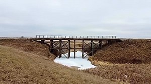 40K views · 1.1K reactions | A visual journey through time and space. My son Alex Brazill captured a drone shot as it glided beneath an old trestle bridge, stretching over the endless expanse of our beloved prairie. The bridge's weathered charm against the vastness of nature - history and serenity. Gotta love it. Chasing yesterday in Truax, Saskatchewan. | Chasing Yesterday | Facebook