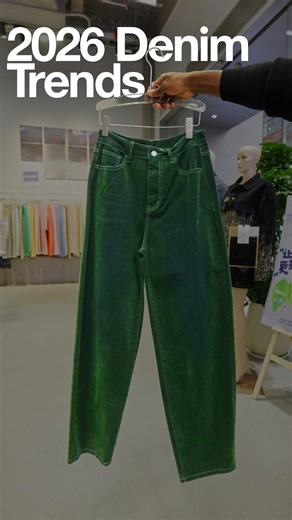 Crease Group on Instagram: "Velvet flocking on denim might be one of the most slept-on techniques out right now. We see it as a key trend in 2026 and it’s not hard to see why. The way the iridescent green hits against the natural blue denim underneath? Crazy. And once you start adding wash levels or layering it over prints… it turns into a whole different conversation. Brands should honestly be abusing this."