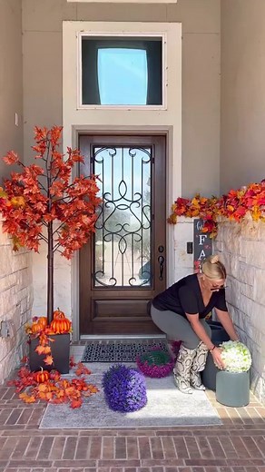 Decorating My Entryway For Fall Part 2✨ Do we love?!!! Guys you can shop everything here BY CLICKING LINK IN MY BIO. Then Click Outdoor Entryway Fall Decorations. Yes shop my maple tree, leaf garland, lights, planters, faux mums and more. Click LINK IN BIO✨ Do you guys see this beautiful Fall SWAG on my door!!!! That was hand made by the fabulous @tina.rbio!!! Follow her and dm her if you want one made. She does all designs and even amazing ones for Christmas!!!✨ Jumbo pumpkins are from hobby lo