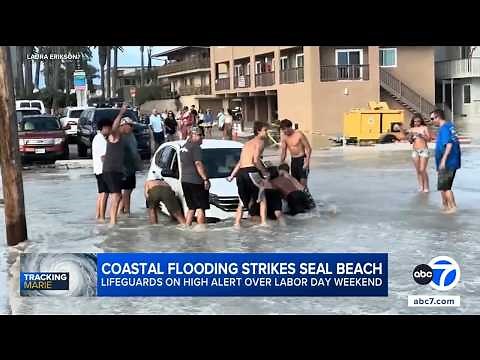 High surf from Hurricane Marie floods Seal Beach, fuels dangerous rip currents