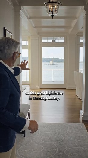 Smiros & Smiros Architects on Instagram: "Set on the waterfront in Huntington Bay and designed to frame the ebb and flow of light over the Sound, this Shingle Style home reflects a thoughtful dialogue between tradition and place. Shingled façades, refined stonework, and broad porches welcome the breeze. Built by @stokkersco Interiors by @srcinteriors"