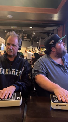 OneCourt Technologies, Inc. on Instagram: "Who’s tuning in for today’s game? Last Saturday for the NFC Divisional Round game between the Seahawks and the 49ers, we were joined by a father and son duo at Legion Sports Bar in Bellevue. Both of them got to try the OneCourt experience while cheering on the Seahawks! We’ll see you at the next watch party 👋 Video description: a father and son sit next to each other in a bar with the OneCourt tactile broadcast tablet under their hands. The bar is full