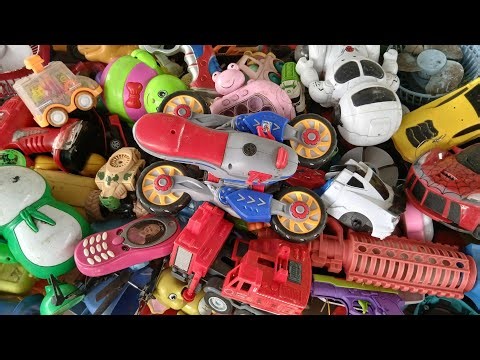 Discovering a pile of old toys | Transforming spaceship, robot, car, old phone & mini fan revealed.