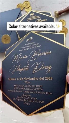 This navy wedding invitation features a striking geometric shape with elegant gold foil script and a