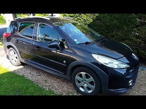 remplacement triangle et coupelle d'amortisseurs sur Peugeot 207. Vidange moteur et de boite.
