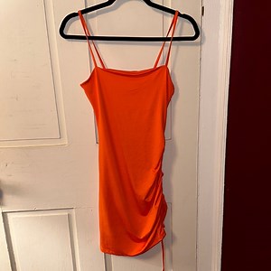 Neon orange mini dress with adjustable side tie / cinch