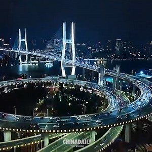 41K views · 1.6K reactions | Streetlights and headlights brighten up Shanghai nights on the Nanpu Bridge. #ChinaStory | China Daily | Facebook