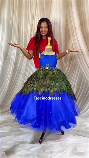 Fascinodresses|artificial peacock feather ballgown|trending mayil dress|peacock frock|partywears