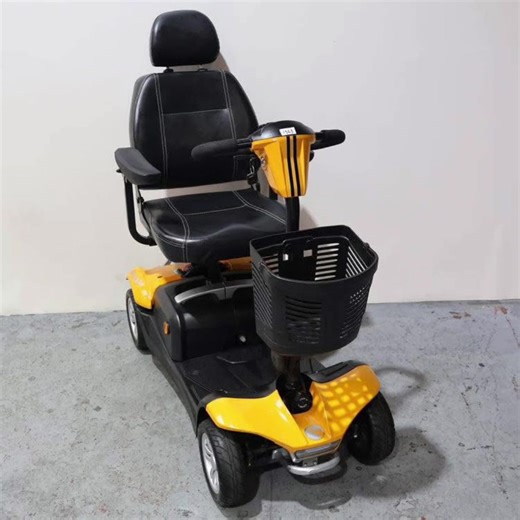 Price: 350. Rascal Vista DX mobility scooter. Performance & Range: The scooter has a maximum speed of 4 mph (6.4 km/h) and an impressive range of up to 34.5 miles (55.52 km) between charges, thanks to its 50Ah battery. It has a maximum carrying capacity of up to 150 kgs (23.6 stone). Comfort & Ride: It features all-round suspension for a smooth and stable ride. The luxury Captain's seat is padded and includes a headrest, adjustable armrests, and integrated swivel and slide functions for comfort 