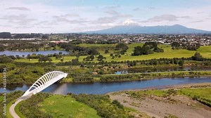Mount Taranaki From Te Rewa Rewa Bridge Over Waiwhakaiho River Near Lake Rotomanu And Golf Course In New Plymouth, New Zealand.