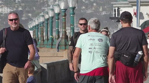 Crowds gather at Mission Beach boardwalk following Saturday's storm