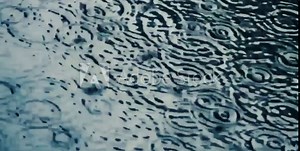 splashing water that occurs when rainwater falls on a puddle