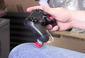 Watch modder Ben Heck hack a PS4 controller for single-handed gaming, includes 3D-printed parts