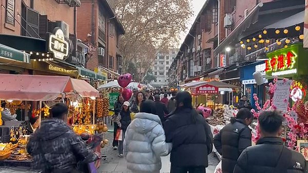 Wuhan market brimming with crowds five years after lockdown