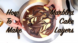 Whether you call them marble or marbled cake layers (I'm team marbled!), these chocolate and vanilla swirled cake layers are to die for! Not only is the recipe simple, straight-forward, and made in one-bowl, I also add in a fudge ripple, to take it to the next level. This recipe essentially mergers together my favorite vanilla layer cake recipe with my chocolate cake recipe, and magically makes it all happen in the same mixing bowl. It really is the best of both worlds! The full recipe can be fo