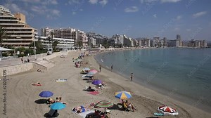 Costa Blanca beach in Spain Levante La Fossa playa Calpe with people