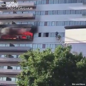 35K views · 962 reactions | HIGH-RISE INFERNO: Fire engulfed a 25-story apartment building in Los Angeles – with new video showing one resident’s dramatic rescue from the side of the building and others airlifted from the roof; eight people, including a baby were injured in what officials are calling a “suspicious” blaze. More tonight. https://abcn.ws/2vsraZH | ABC World News Tonight with David Muir | Facebook