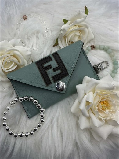 Are you obsessed as we are 🤭🤩 Authentic Upcycled Fendi Wallet available soon! #authenthic #upcycling #fendi #smallbusiness #womenownedbusiness #designerbags #unicorn #upcycled #wallet #luxurygirl