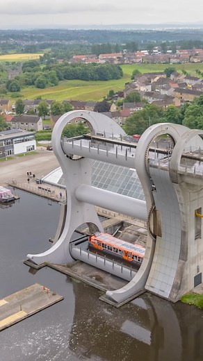 2.8M views · 12K reactions | This clip of the famous Falkirk Wheel turning gives a view of the rear and the massive cogs operating as the Wheel rotates. Did you know that the original concept for the mechanism was designed/demonstrated using a small LEGO model?!  | Scotdrone | Facebook