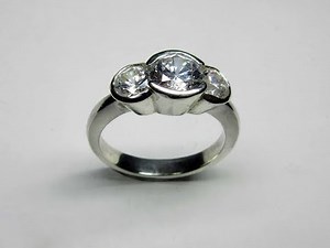 Bezel set three stone ring preview