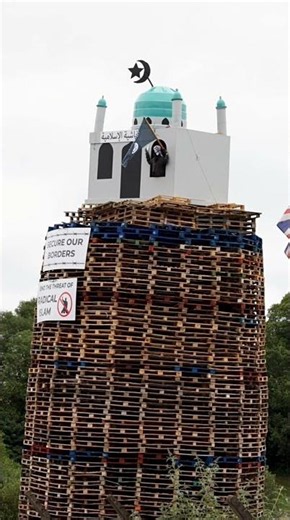 A controversial recreation of a mosque has been placed on top of a bonfire in Moygashel
