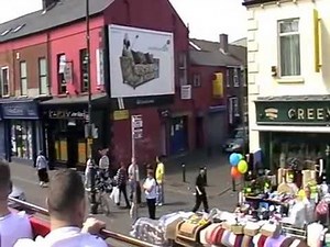 A TOUR OF BELFAST FALLS ROAD FROM OPEN BUS