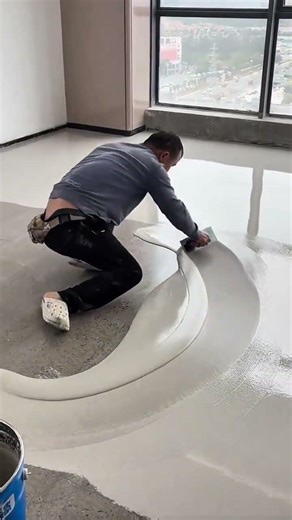 Applying a self-leveling epoxy coating to create a smooth and glossy interior floor finish