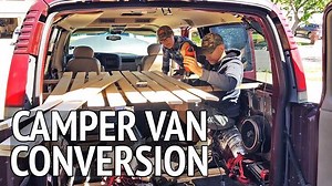 Build out of GMC passenger van into a temporary conversion van. This camper van conversion has a portable camping toilet, portable lithium battery, portable camping fridge, etc... Detailed van build specs: https://weretherussos.com/diy-camper-van-build/ | We're the Russos