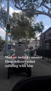 Man on mobility scooter films collision with delivery robot