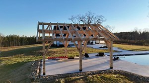 Kada Frames 24' x 24' Timber Frame Pavilion. $24,900 Installed. Its Cold now but it will be Pool Season Soon. Lots of Room for Kitchen or Fireplace. Our True Kingpost Truss Design Allows us to span up to 24' with No Center Posts. Massive 8" x 10" Southern Yellow Pine Beams-We Mill them here in Jefferson, Ga to insure Sizing and Quality. Beams and Posts Treated with Bora-Care with Moldcare for Pest and Mold/Mildew Protection. 1" Pine Roof Sheathing Like Builds from a 100 Years Ago! Metal Roof Inc