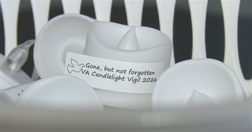 Families share grief at candlelight vigil