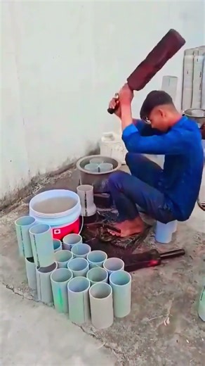 The process of expanding PVC pipes using a homemade wooden hammer