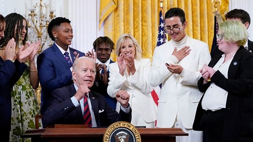 Biden signs executive order to fight anti-LGBTQ state bills