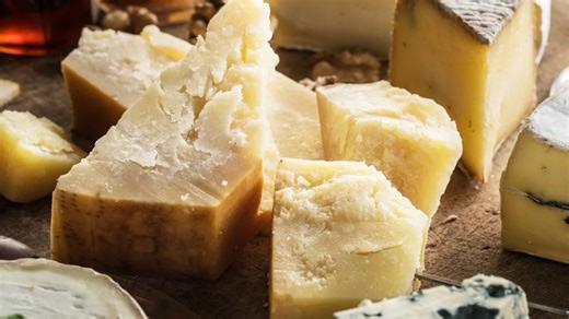 The Real Reason Why Aldi's Cheese Is So Cheap