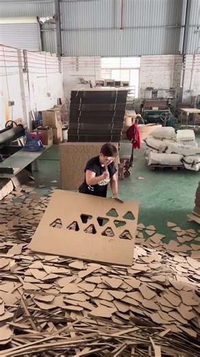 Cardboard Art: Creating Geometric Panels in a Factory