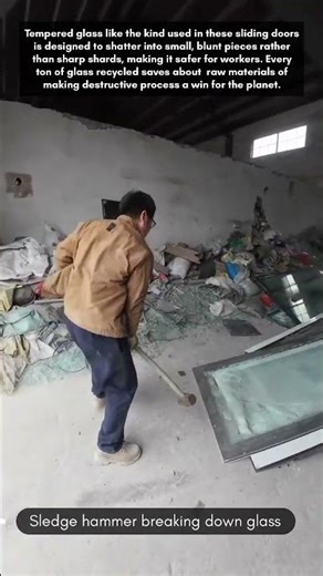 Sledge hammer breaking down glass