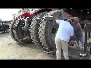 Massive Tractor tyre changing.