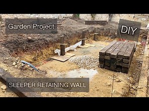 Installing a Sleeper Retaining wall and choosing our paving slabs