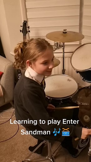 Grace here learning to play Enter Sandman. Nailed it 🎶🥁 #musiclessons #drums #drumlessons