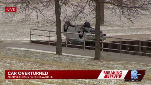 Accused 5-time drunken driver crashes, car dangles over Lake Michigan