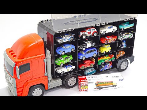 Cars characters come in big red trucks. Let's take a look at each one.