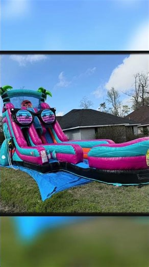 22’ beach vibes dual lane waterslide. Bouncing on da bayou inflatables Slidell LA