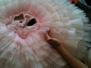 Ok, we had so much fun doing the first video, that we decided to do another. Here is Jessi, hand-tacking a tutu. Claudia narrating again - she just loves to talk. | Tutu.Com