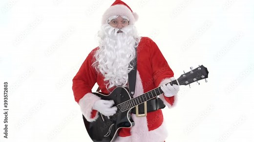 Santa Claus guitarist plays guitar. Santa is guitar player playing acoustic electric guitar, singing Christmas song on white background