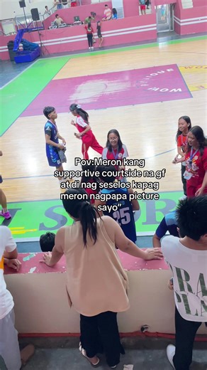 Supportive Girlfriend in Basketball: Celebrating Courtside Cheer