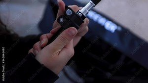 Gaffer for Lighting Equipment Setting up a Light in a Studio